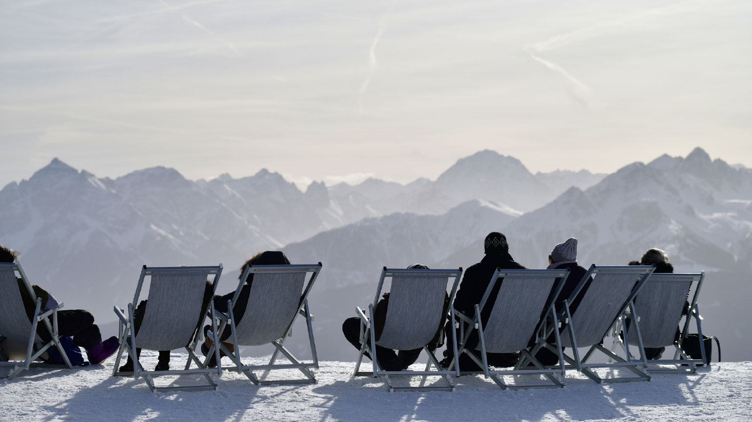 Photo of people enjoying mountain view