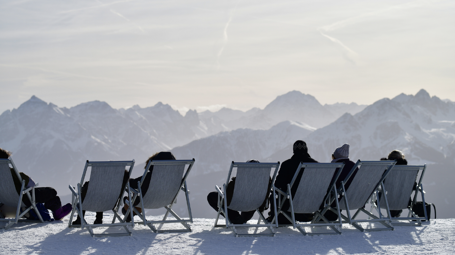 Photo of people enjoying mountain view