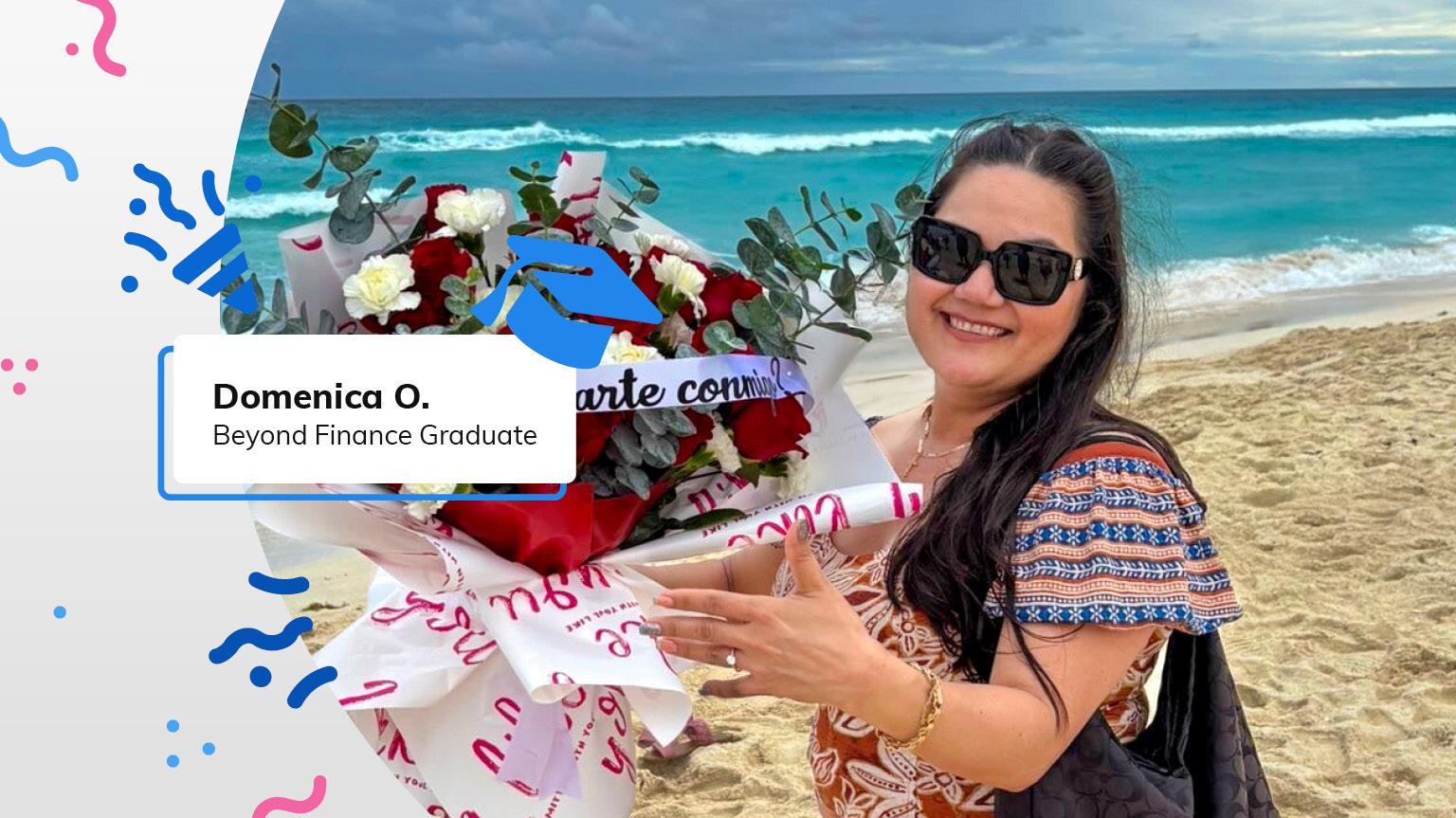 Beyond Finance graduate Domenica O. poses on a beach with flowers