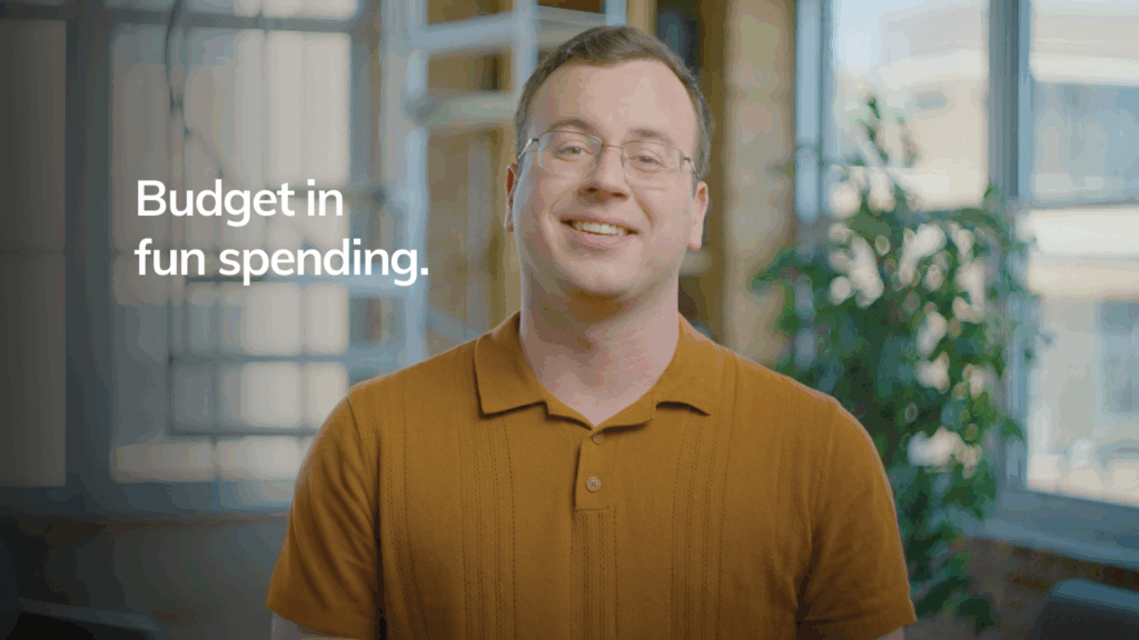 Financial Therapist Nathan Astle smiles as he explains why overspending happens and how to stop it