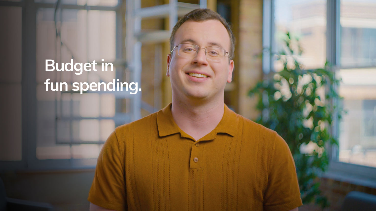 Financial Therapist Nathan Astle smiles as he explains why overspending happens and how to stop it