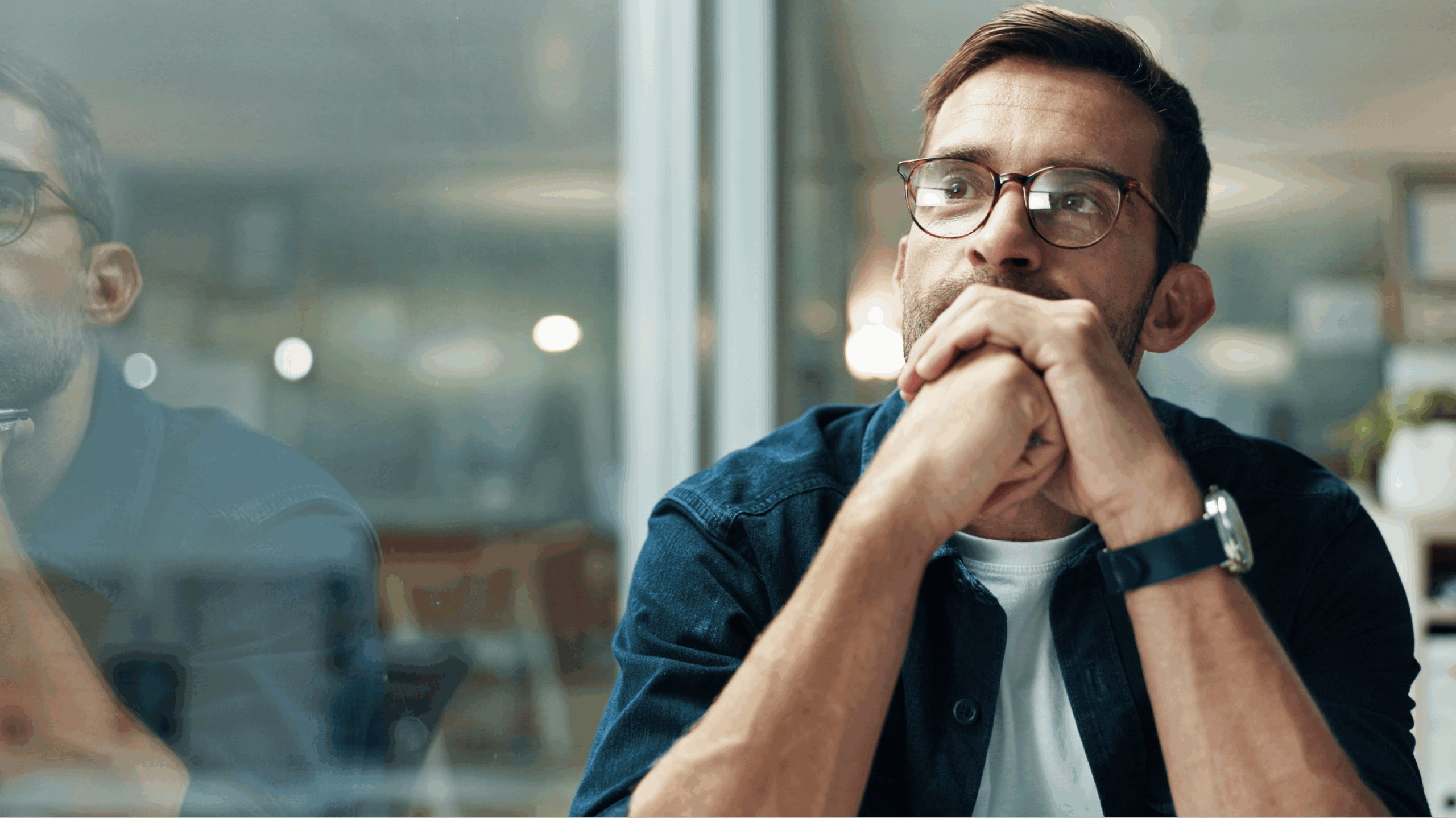 Man thinking, working on healing negative thoguht patterns about money