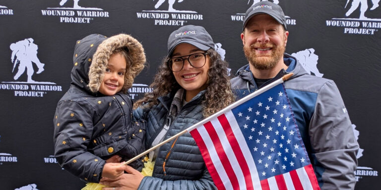 Army Veteran and Beyond Finance Employee and Graduated Client Edward Rider Marches in NYC Veterans Day Parade With Wounded Warrior Project
